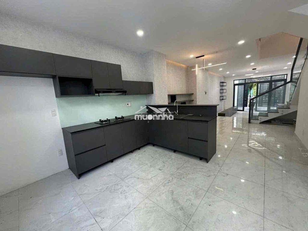 Nhà đẹp(5 *20m)4 tầng,mt đường 10m, đối diện công viên ở kdcư phú lợi - 2