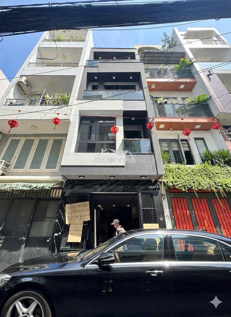 Mg3%-489a/23/29 huỳnh văn bánh, p.phú nhuận. dt 3,5x13,5m, 5 tầng