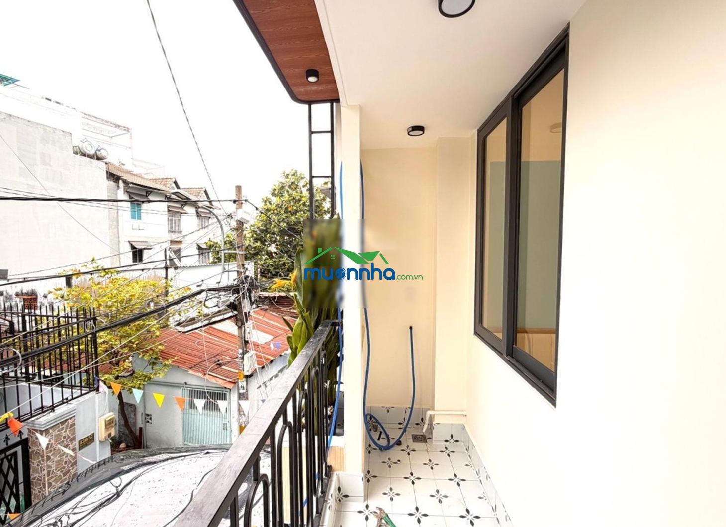 Phan văn trị,p11.bình thạnh 2tầng44m2(3,5dài13) 3pn3wc hẻm xe hơi thông 5met ,sát mặt tiền 40m - 4