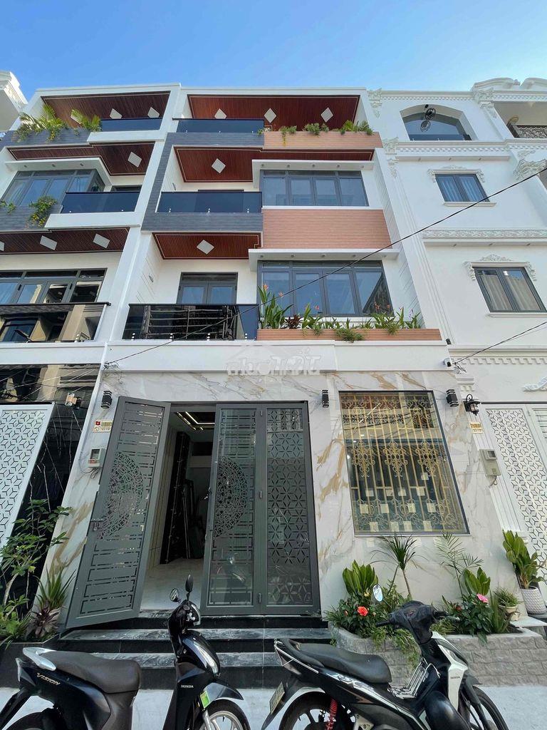 Nhà phố xây dựng mới có thang máy - đường thông 8m 2279 huỳnh tấn phát