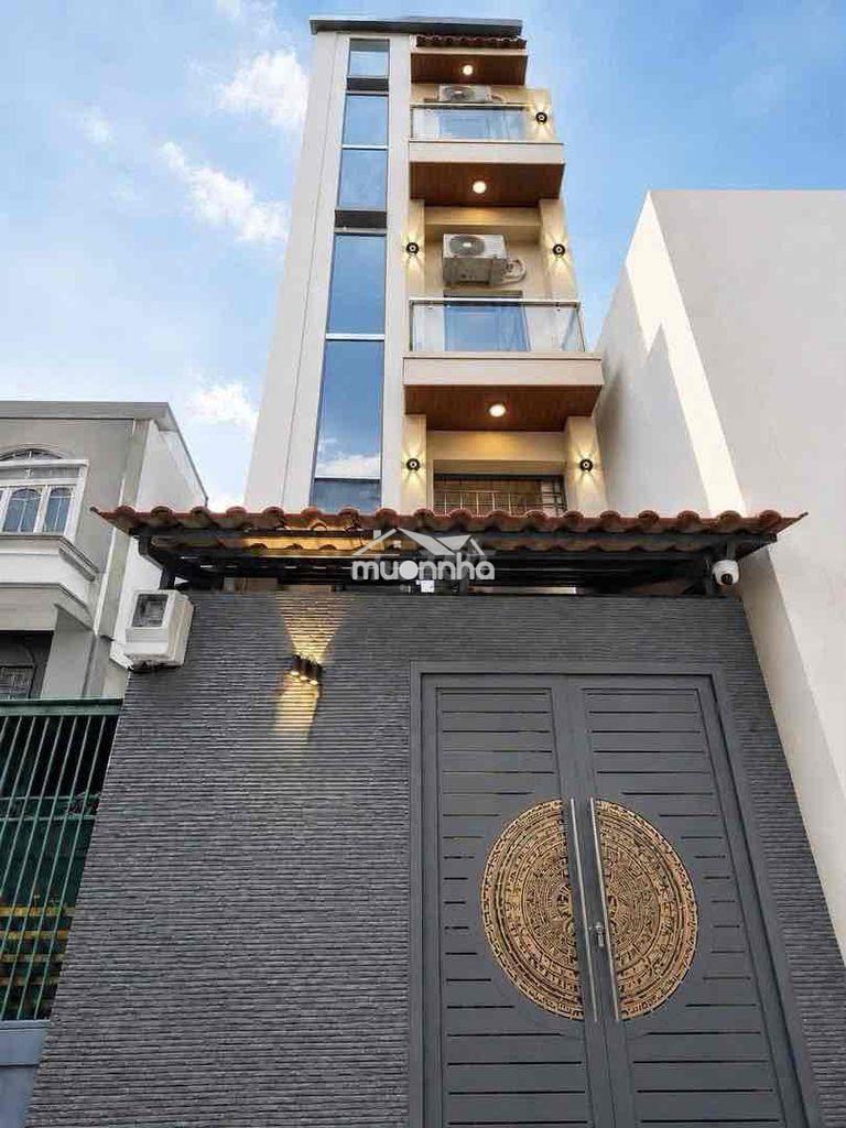 Bán nhà quận 4, 40m² nở hậu 5m², 4 tầng có hầm, dòng tiền 30tr/tháng
