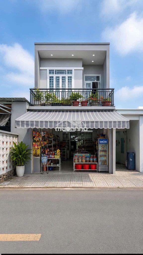 Bán nhà lầu đang kd siêu thị mini,mặt tiền chợ,bình hòa thuận an