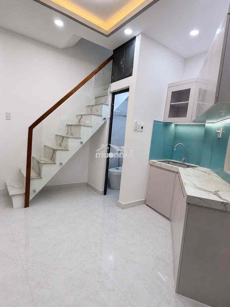 Nhà mới , trệt lầu lửng , sd 30m2 , trước nhà 3m , q4. - 2