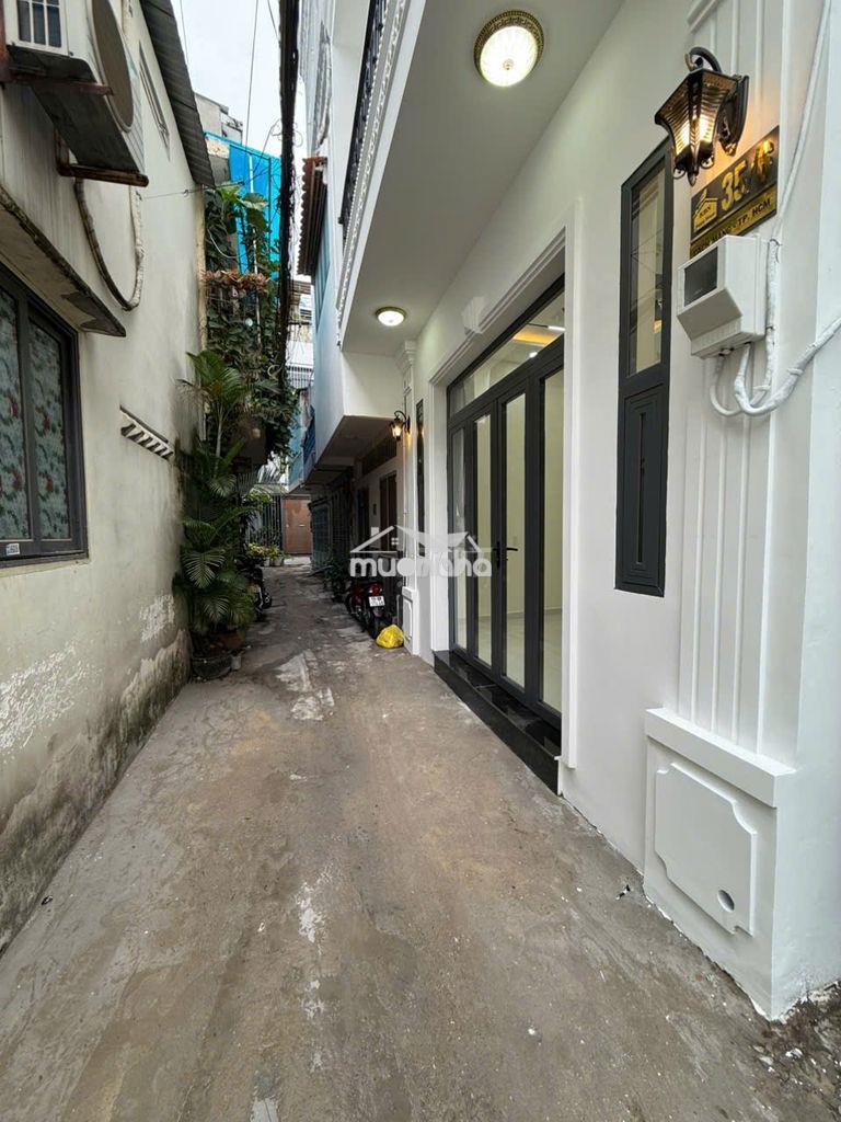Nhà mới 100% cách mạng 5x6 1 lầu 2 pn